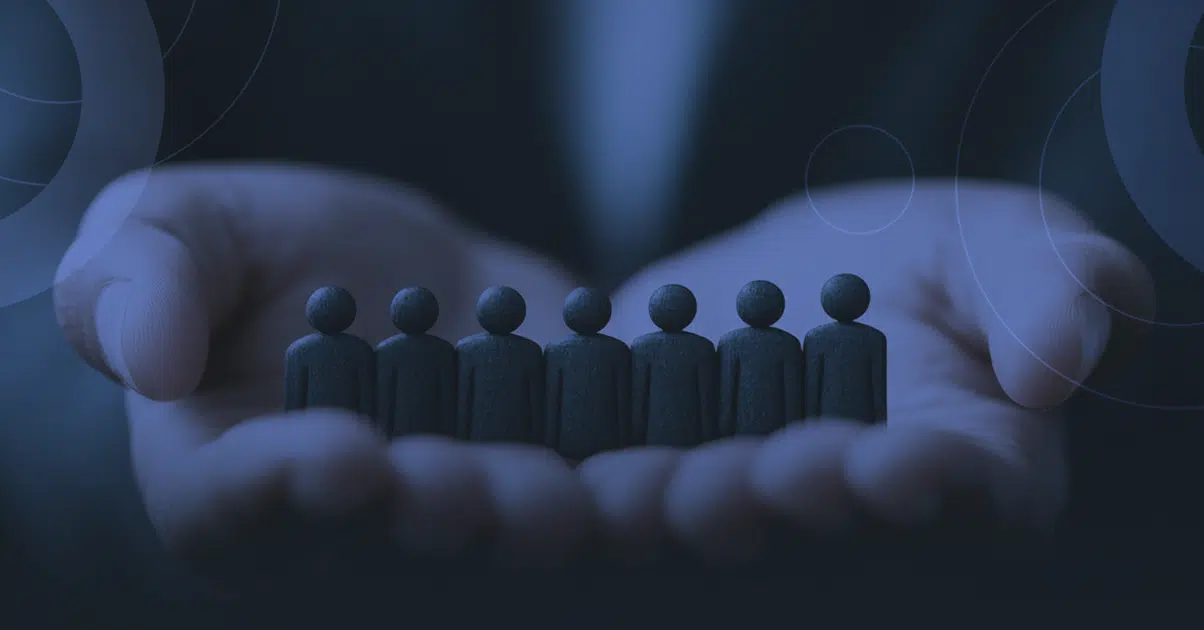 Hands protecting human figurines symbolizing how active testing safeguards telecom customers from service issues before they impact business operations